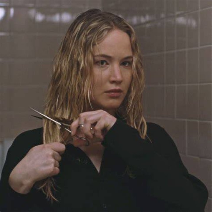Jennifer Lawrence beams with joy as she and husband Cooke Maroney take